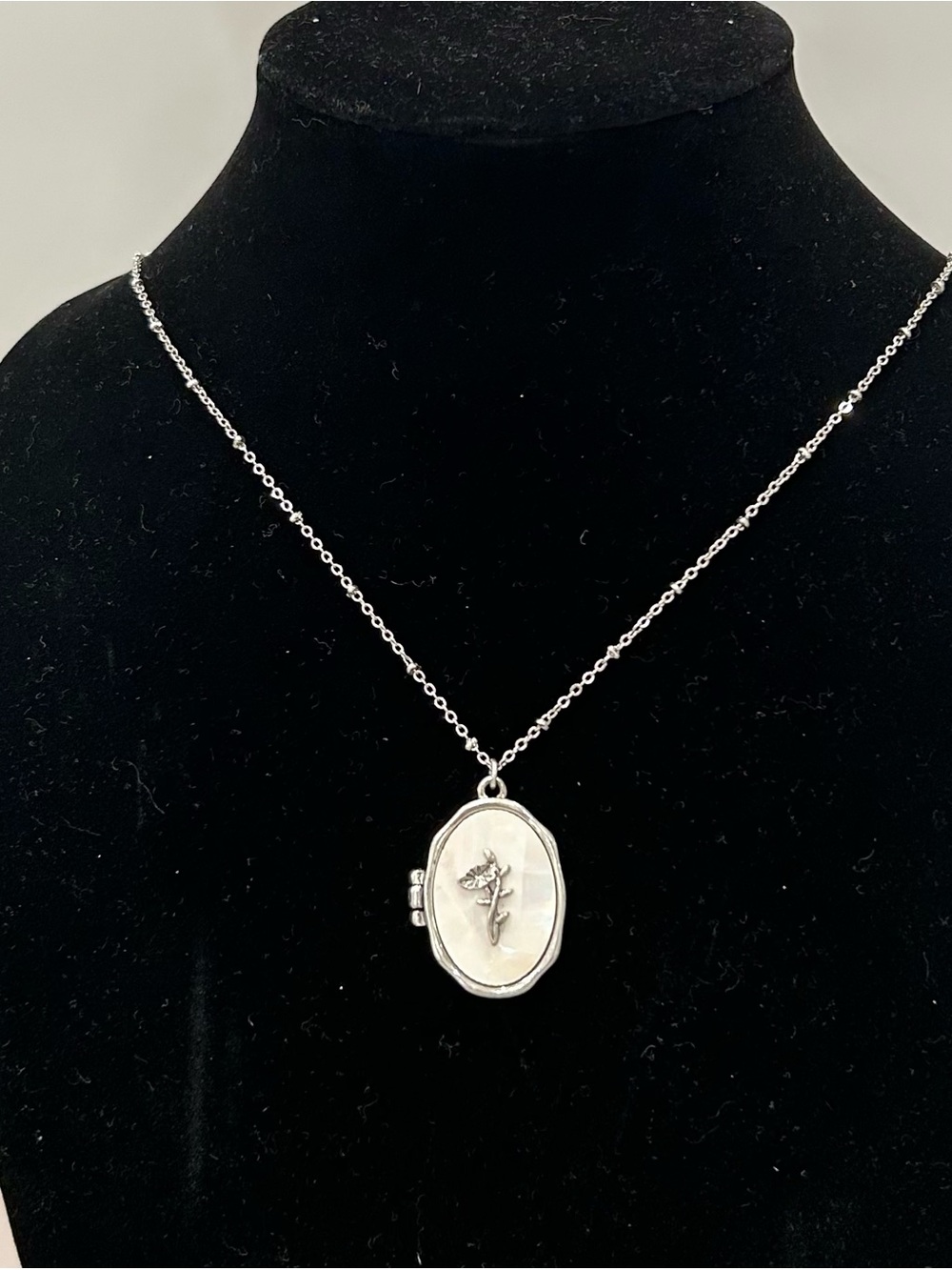 Silver Tone Oval Locket Necklace with Mother of Pearl Rose Motif